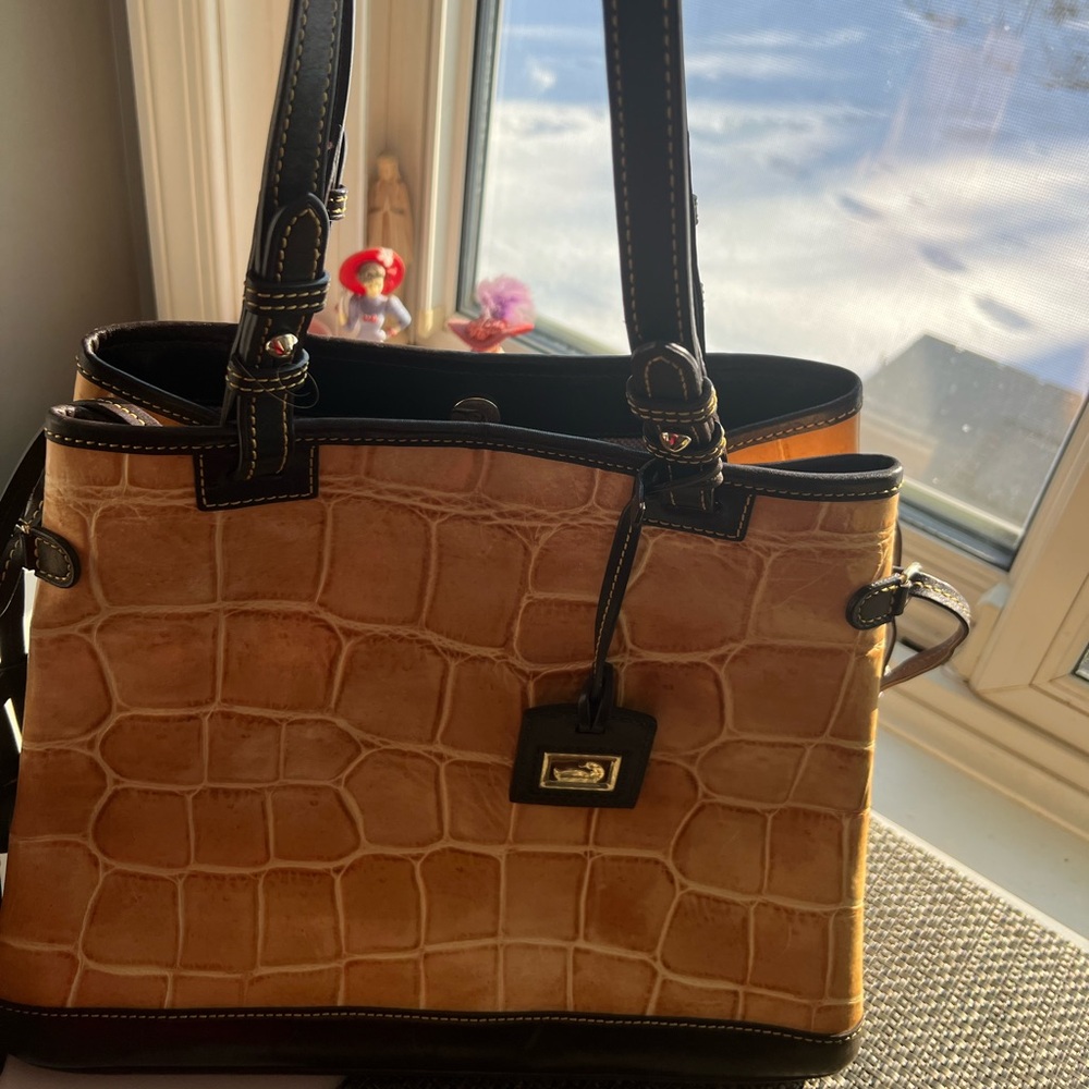 Dooney & Bourke Croc-Embossed mustard/yellow with brown accents.